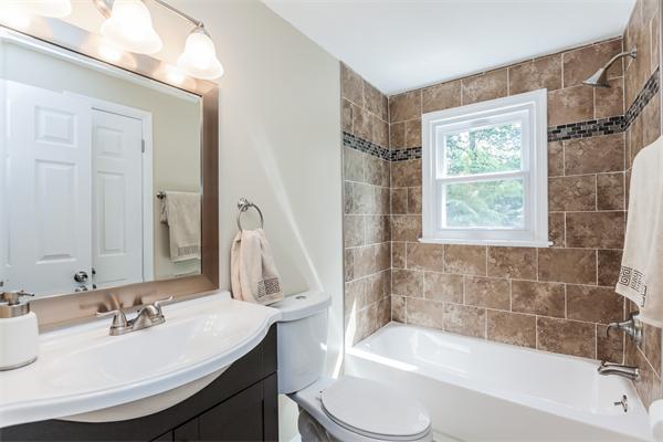 185 Redlands Street Springfield, MA 01104 - Photo 18 of 28 a bathroom with a sink toilet tub and shower