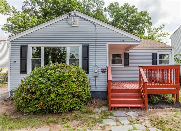 185 Redlands Street Springfield, MA 01104 - Photo 6 of 28 a front view of a house with a garden
