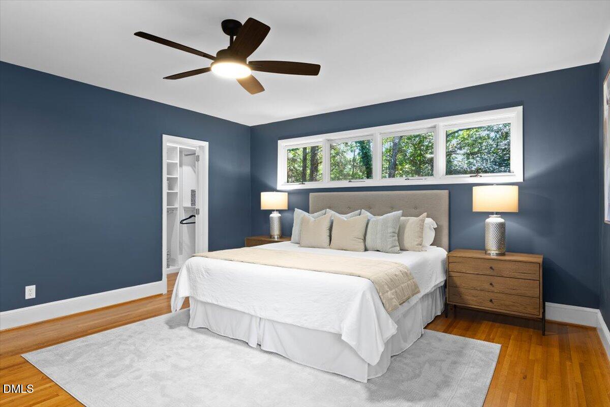 1401 Spring Forest Road Raleigh, NC 27615 - Photo 24 of 47 a bedroom with bed and window