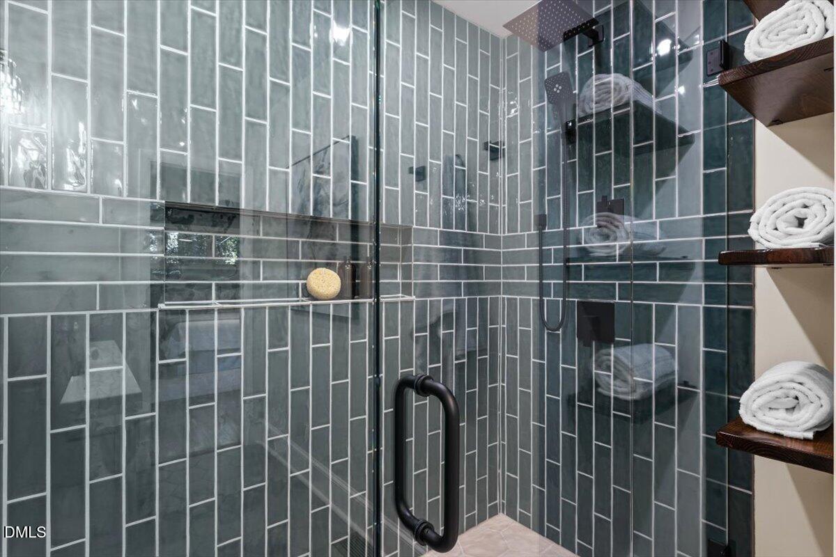 1401 Spring Forest Road Raleigh, NC 27615 - Photo 27 of 47 a bathroom with a shower