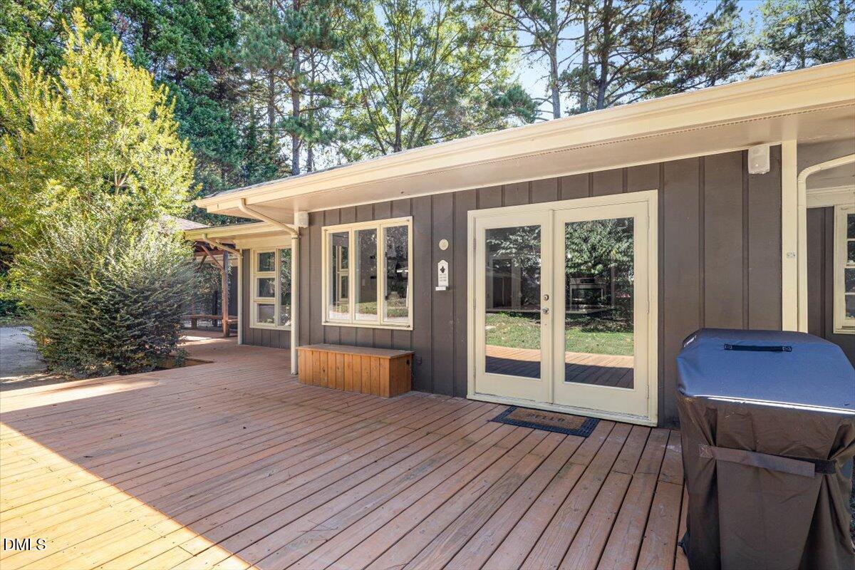 1401 Spring Forest Road Raleigh, NC 27615 - Photo 40 of 47 a house with wooden floor and seating space