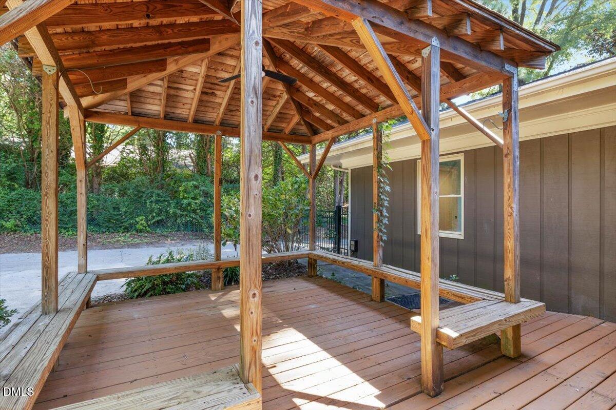1401 Spring Forest Road Raleigh, NC 27615 - Photo 40 of 47 a balcony view with a large window and wooden floor