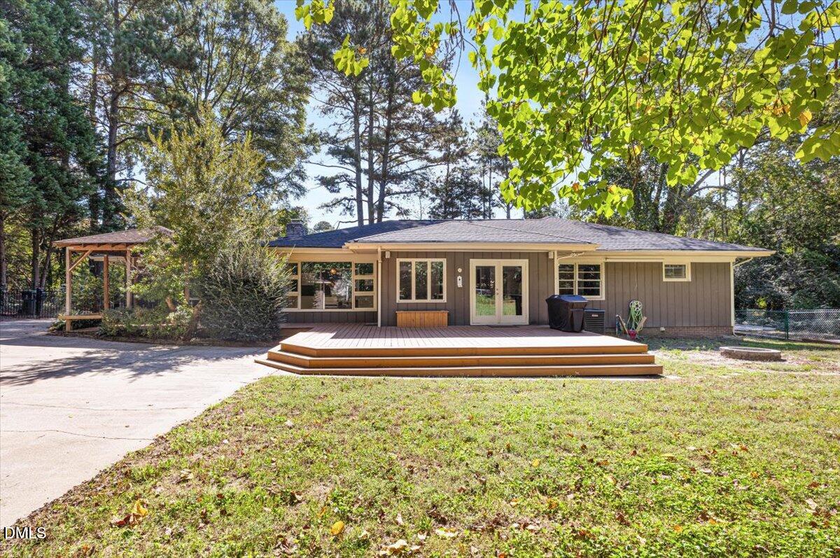 1401 Spring Forest Road Raleigh, NC 27615 - Photo 44 of 47 front view of a house with a yard
