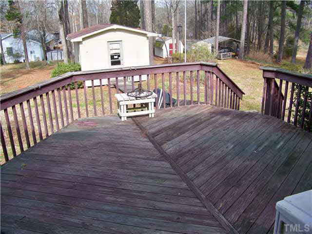 436 Sherron Road Durham, NC 27703 - Photo 6 of 19 Big Deck for outdoor entertainng & view of out buildings / workshops Patio/Deck