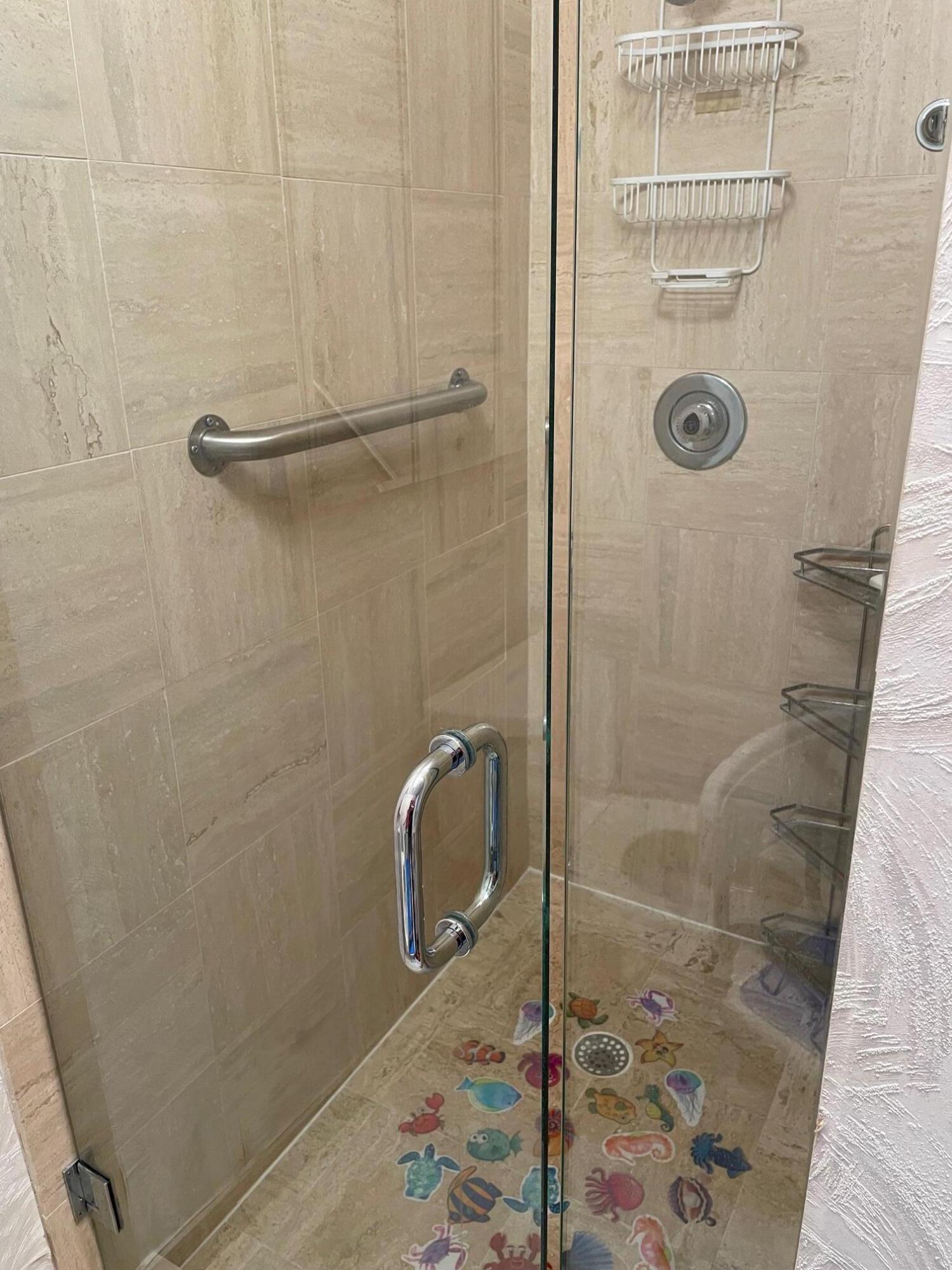 7472 La Paz Boulevard, Unit 205 Boca Raton, FL 33433 - Photo 11 of 14 master bath shower