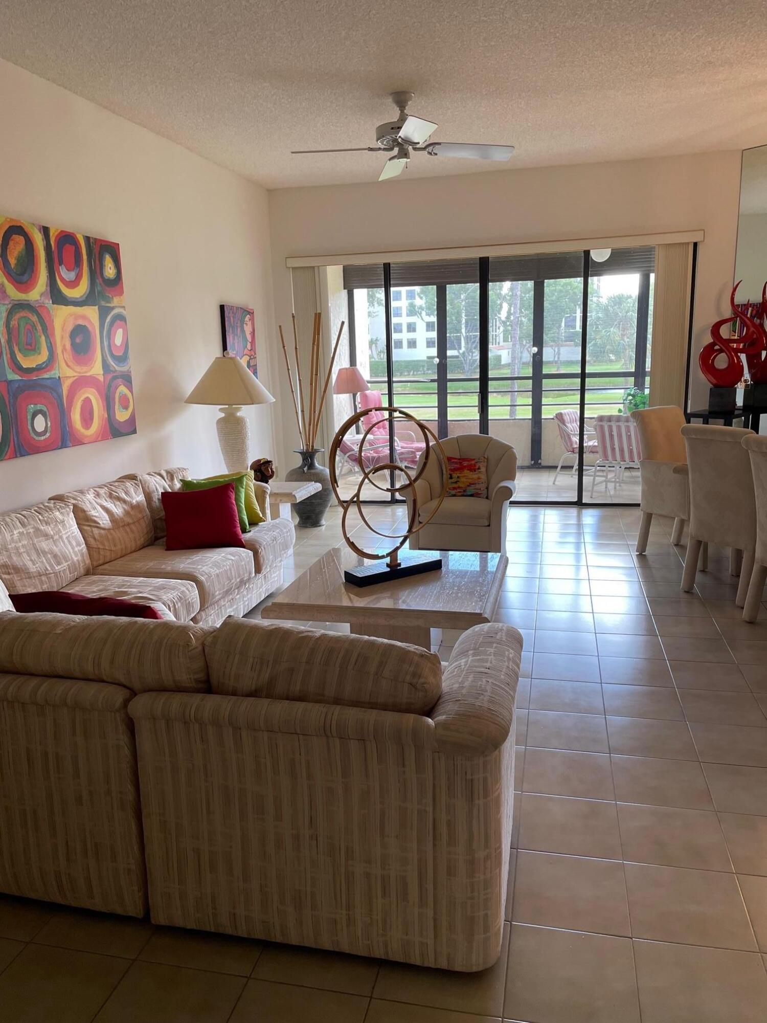 7472 La Paz Boulevard, Unit 205 Boca Raton, FL 33433 - Photo 5 of 14 living room