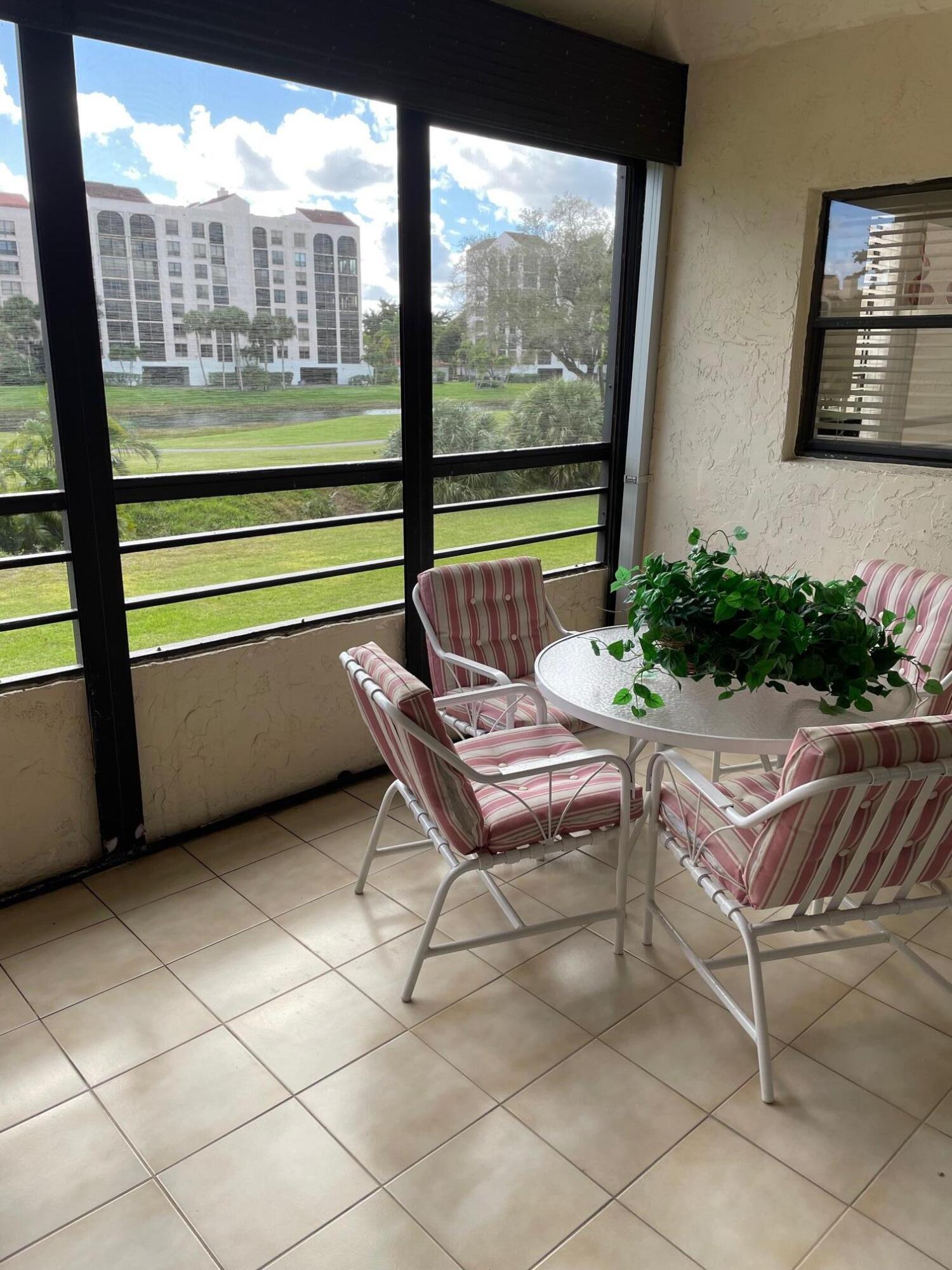 7472 La Paz Boulevard, Unit 205 Boca Raton, FL 33433 - Photo 7 of 14 patio