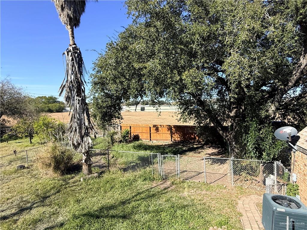 603 South Alamo Road Alamo, TX 78516 - Photo 16 of 17 a view of a yard with plants