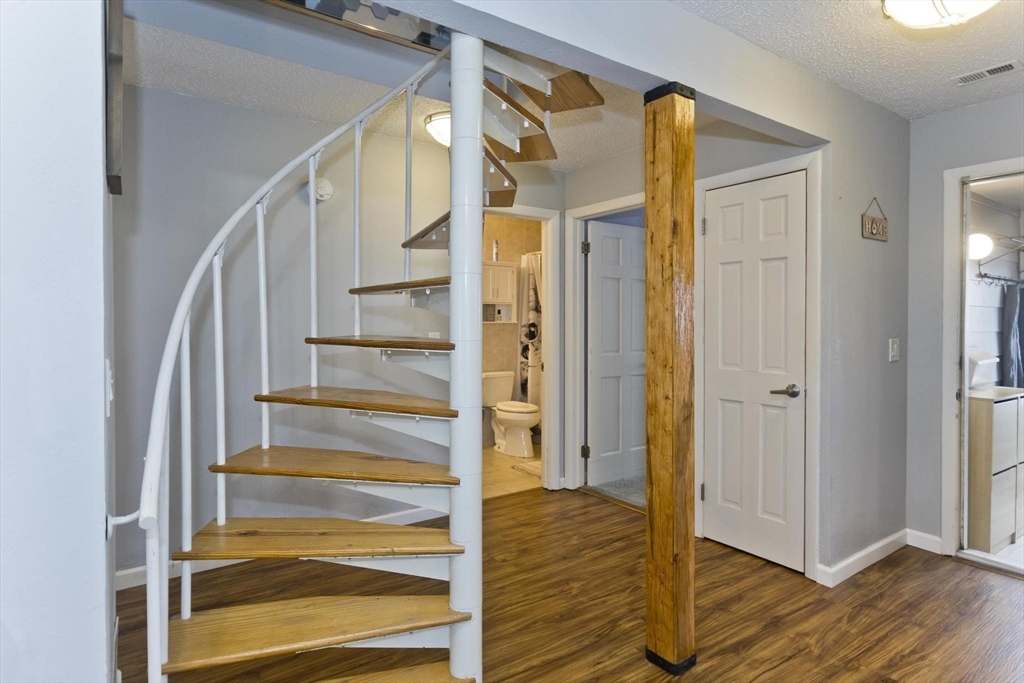 433 Nassau Drive, Unit 433 Springfield, MA 01129 - Photo 22 of 41 a view of entryway with wooden floor and door