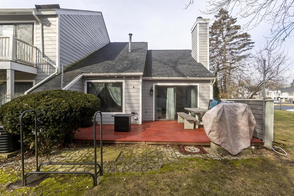 433 Nassau Drive, Unit 433 Springfield, MA 01129 - Photo 3 of 41 a view of house with yard