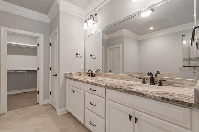 a view of wooden floor windows and entryway