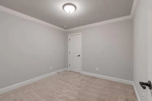 a view of a golf course with a lake