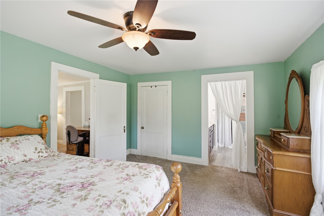 199 Williams Farm Road Westminster, SC 29693 - Photo 13 of 47 This tranquil bedroom features plush carpeting and a ceiling fan for comfort.