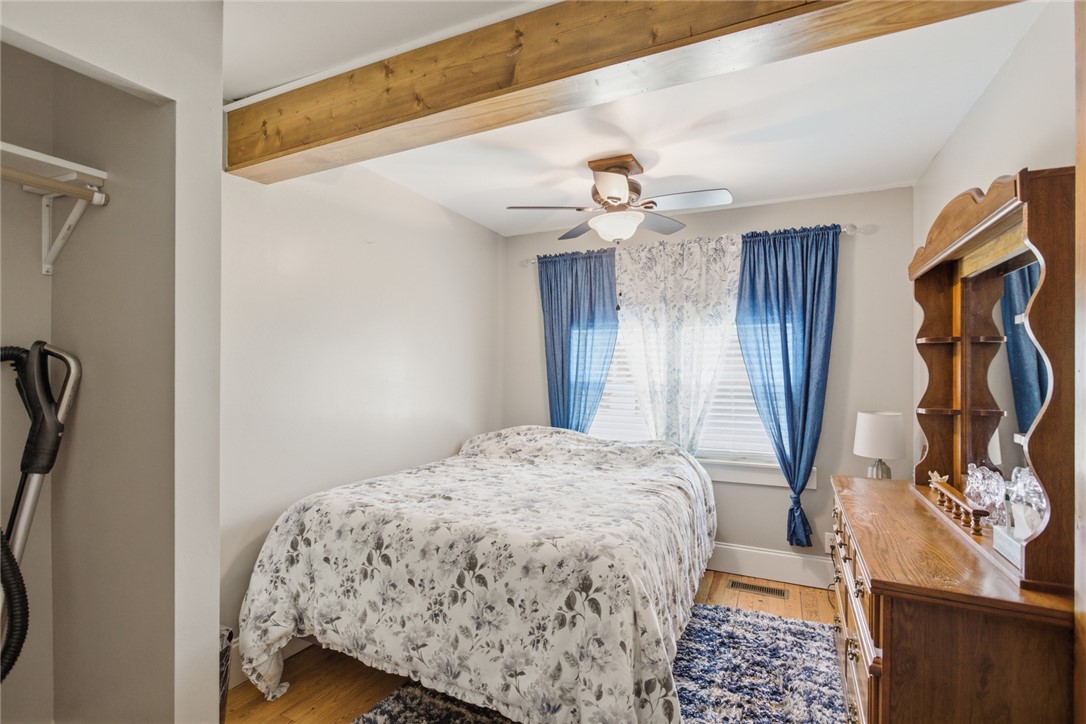 199 Williams Farm Road Westminster, SC 29693 - Photo 15 of 47 This cozy bedroom features exposed beam details, providing a rustic and inviting atmosphere.