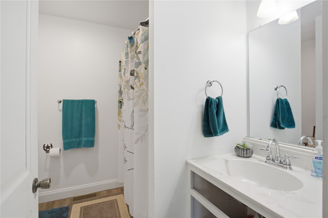 199 Williams Farm Road Westminster, SC 29693 - Photo 21 of 47 This bathroom features a sleek vanity and a functional shower area.