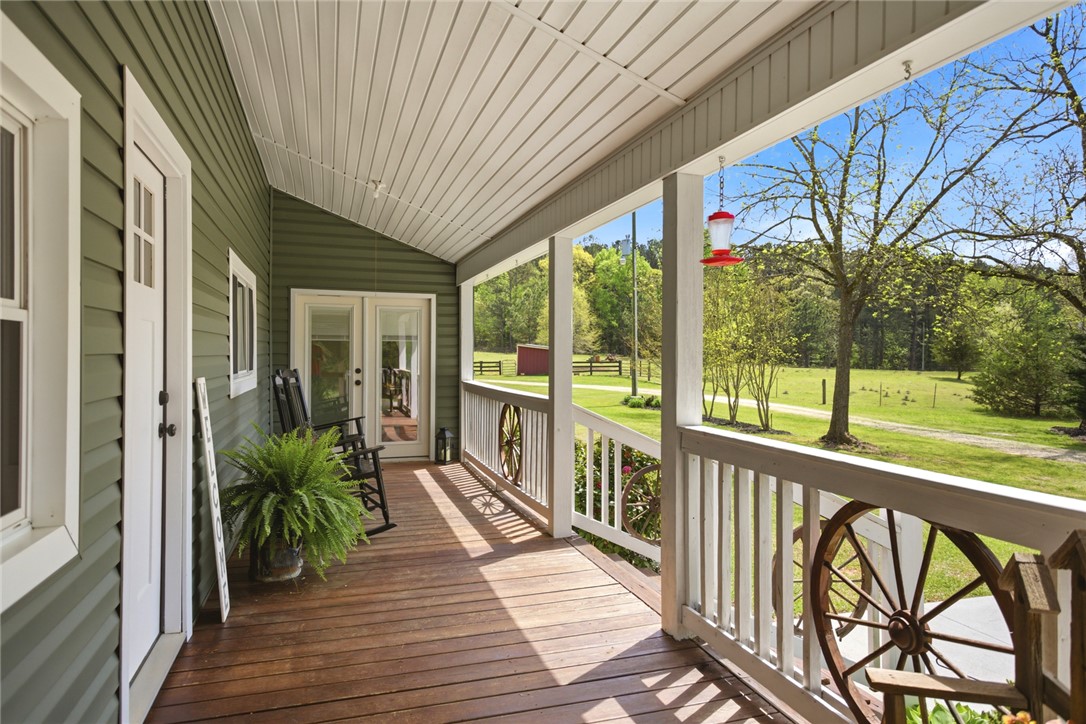 199 Williams Farm Road Westminster, SC 29693 - Photo 24 of 47 This inviting porch offers tranquil views of the expansive yard and lush greenery.