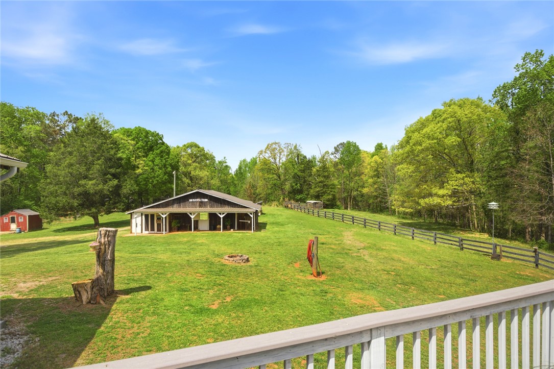 199 Williams Farm Road Westminster, SC 29693 - Photo 26 of 47 This expansive estate offers a picturesque barn and fenced green pastures, perfect for peaceful country living.