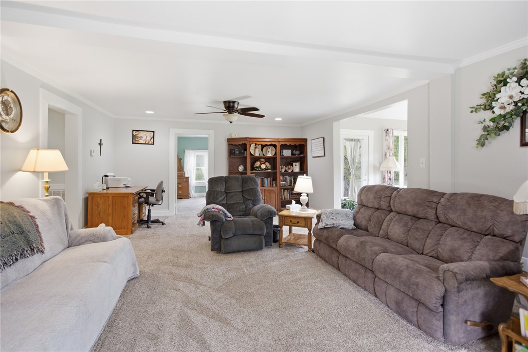 199 Williams Farm Road Westminster, SC 29693 - Photo 3 of 47 This living room provides a comfortable and inviting atmosphere, perfect for relaxation and gatherings.