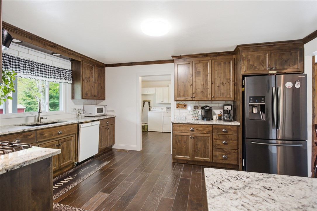 199 Williams Farm Road Westminster, SC 29693 - Photo 4 of 47 This spacious kitchen offers ample cabinetry, modern appliances, and a beautiful view of the outdoors.