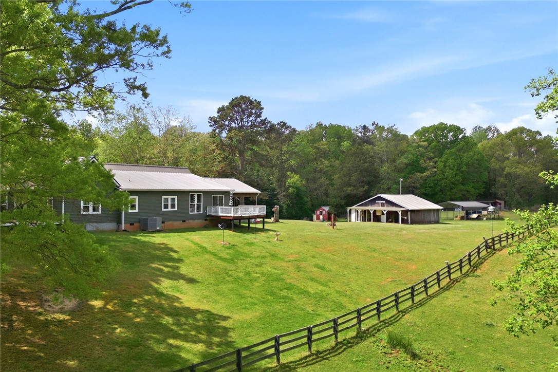 199 Williams Farm Road Westminster, SC 29693 - Photo 44 of 47 This verdant estate presents a spacious lawn and classic farm structures, ideal for rural living.