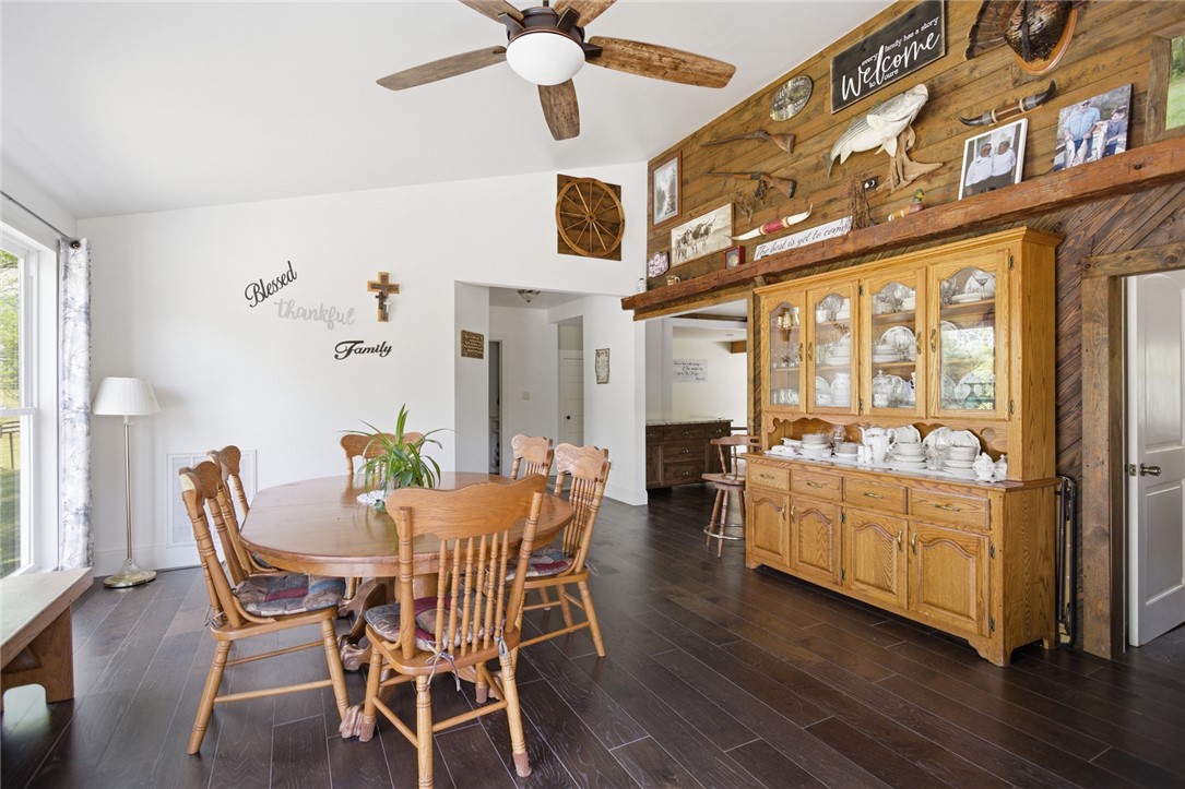 199 Williams Farm Road Westminster, SC 29693 - Photo 9 of 47 This inviting dining area features dark hardwood floors and a striking vaulted ceiling.