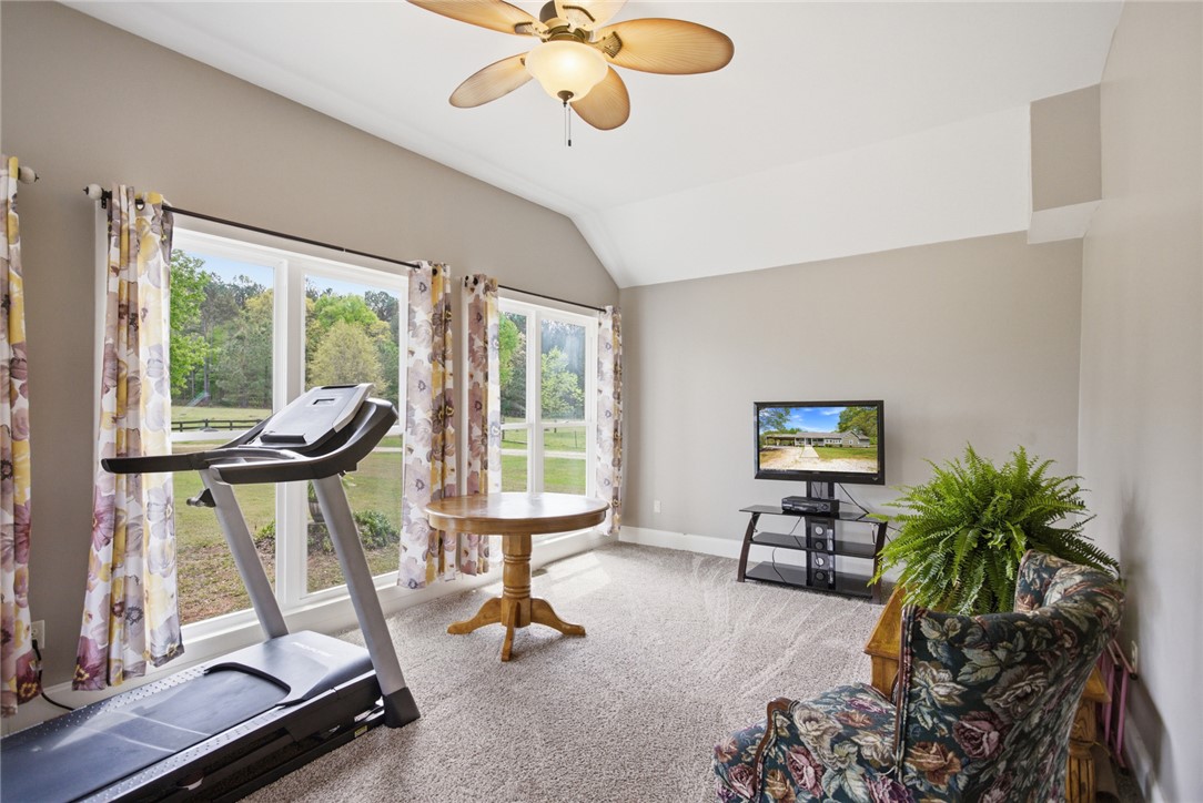 199 Williams Farm Road Westminster, SC 29693 - Photo 10 of 47 Bright and airy space offers comfort and expansive views of the outdoors.