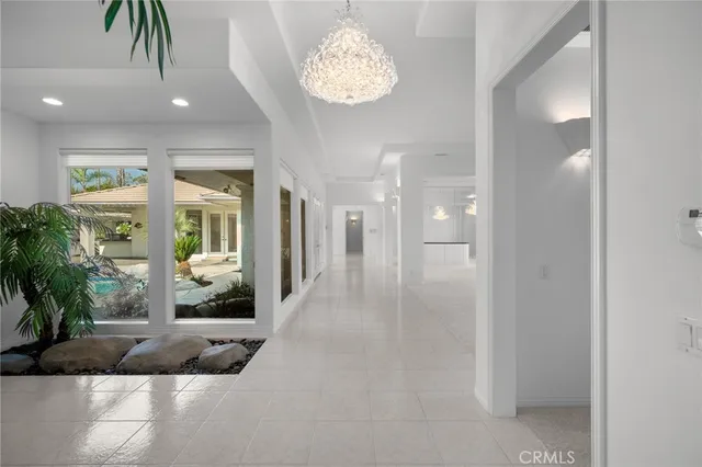 a view of entryway with livingroom