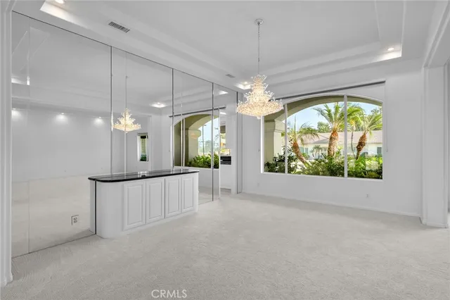 a view of a chandelier in a room