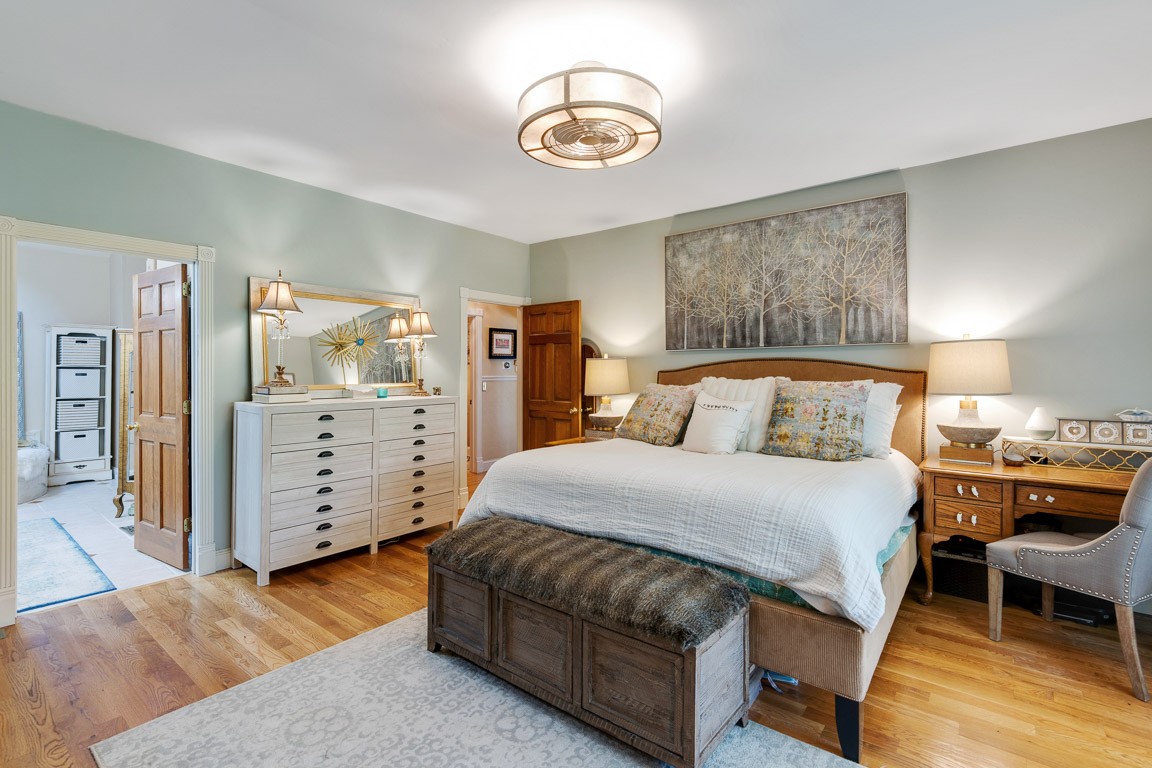 1368 Hunter Road Franklin, TN 37064 - Photo 25 of 45 a bedroom with a bed and wooden floor