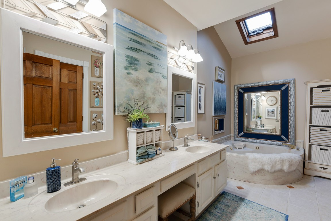 1368 Hunter Road Franklin, TN 37064 - Photo 26 of 45 a bathroom with a sink double vanity and a mirror
