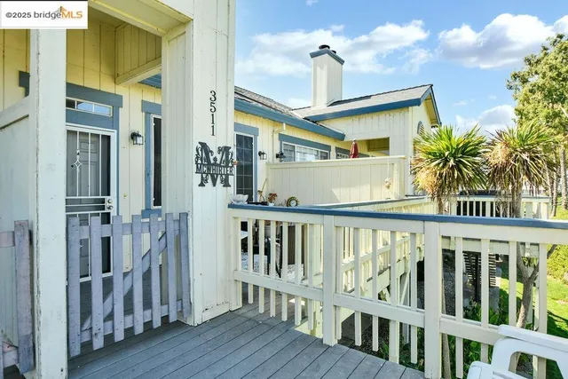 a view of a balcony with an ocean view
