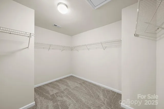 a view of a room with racks on the wall