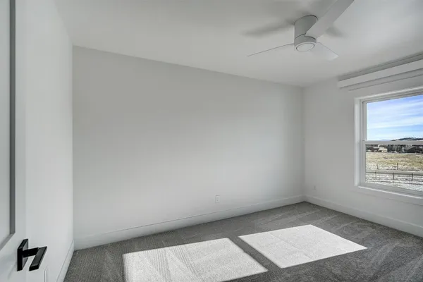 a view of an empty room and window