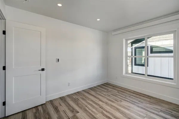 an empty room with windows