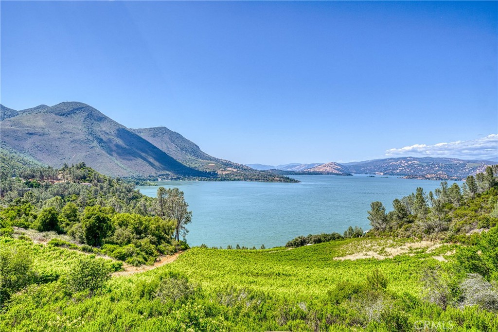4777 Hawaina Way Kelseyville, CA 95451 - Photo 37 of 48 a view of a lake with a mountain in the background