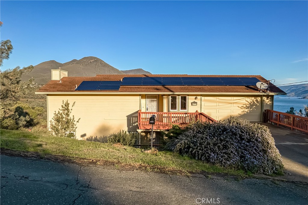 4777 Hawaina Way Kelseyville, CA 95451 - Photo 5 of 48 a front view of a house with a yard