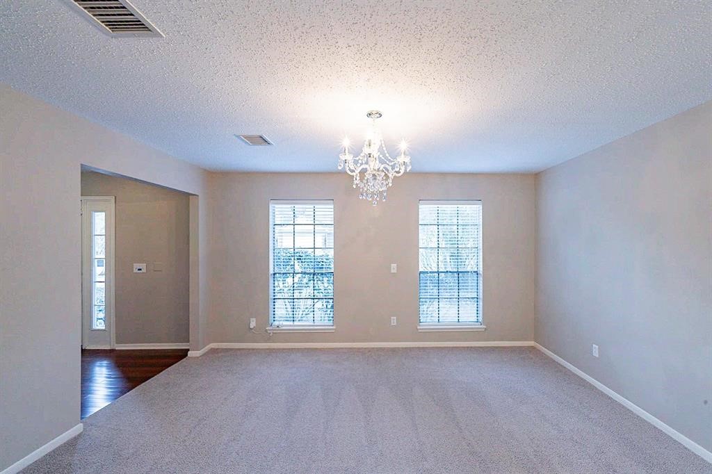 75 Breezy Point Place The Woodlands, TX 77381 - Photo 6 of 19 Looking at living room from dining room area.....
