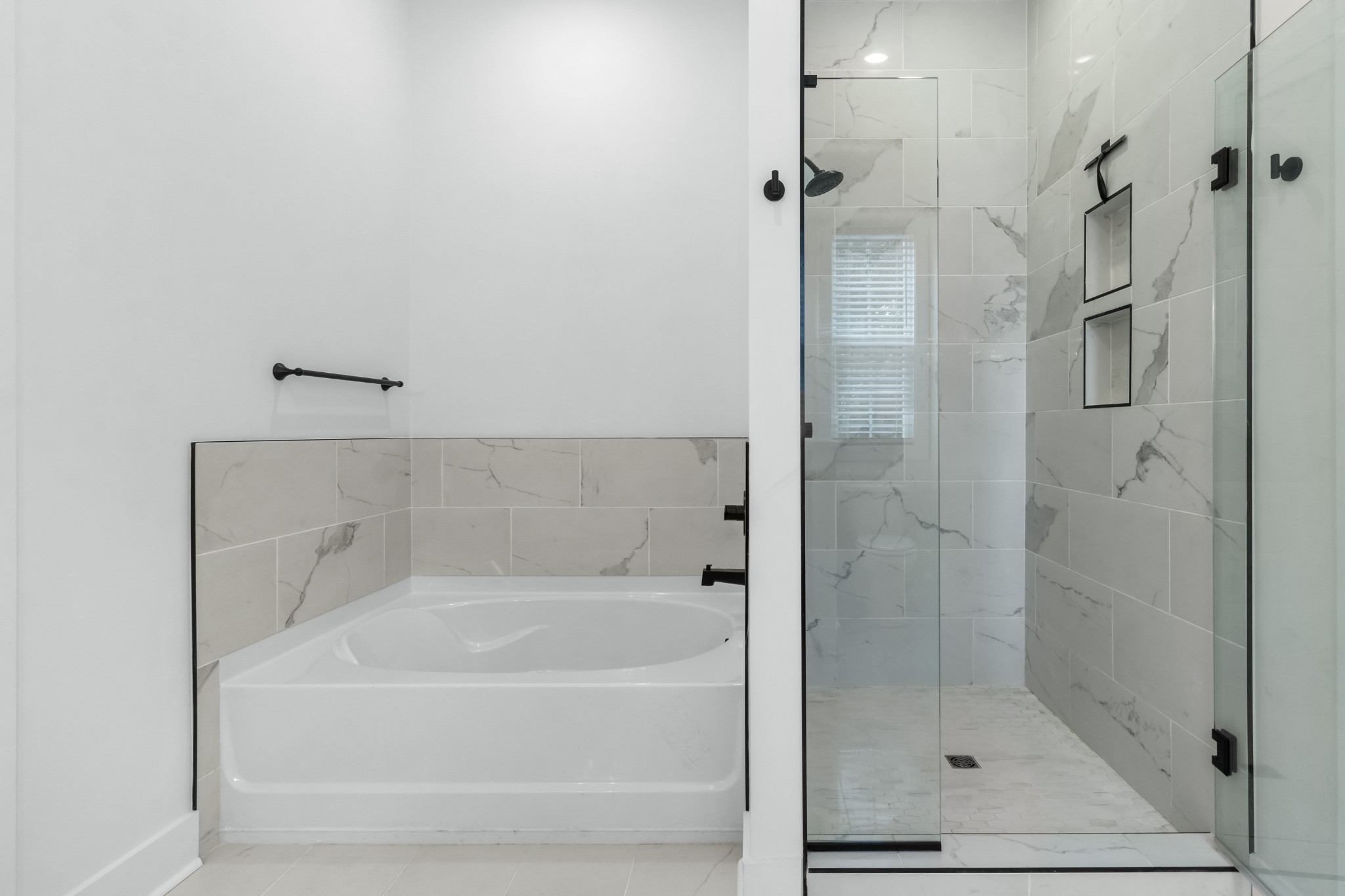 4700 Akin Road Cunningham, TN 37052 - Photo 19 of 36 a white bath tub sitting next to a shower