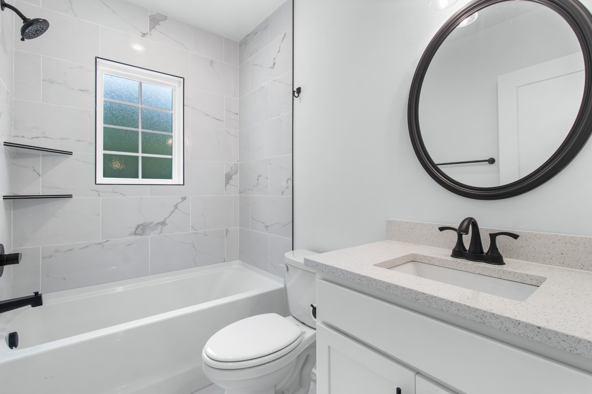 4700 Akin Road Cunningham, TN 37052 - Photo 26 of 36 a bathroom with a sink a toilet and a mirror