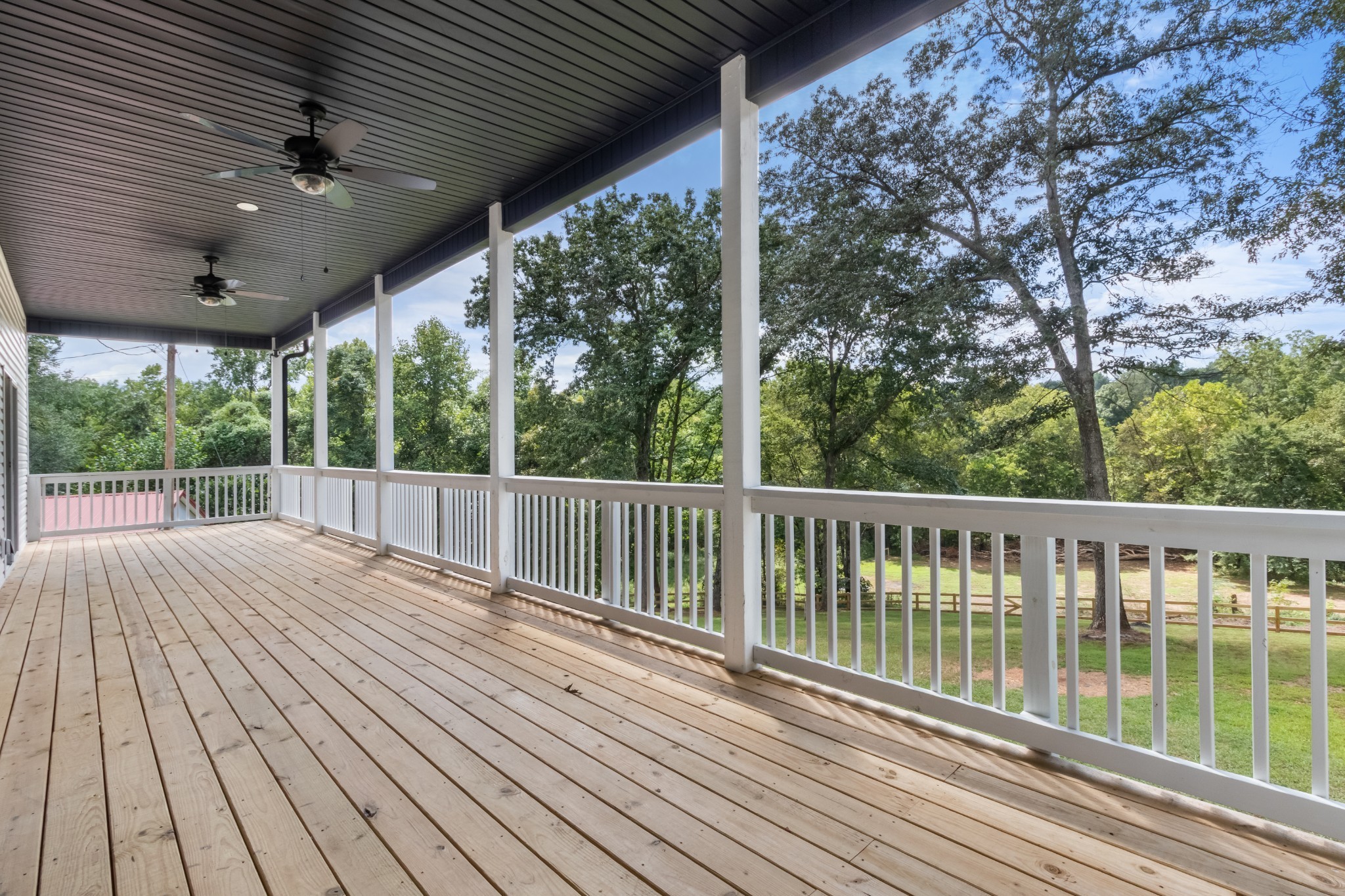 4700 Akin Road Cunningham, TN 37052 - Photo 28 of 36 a view of balcony with wooden floor