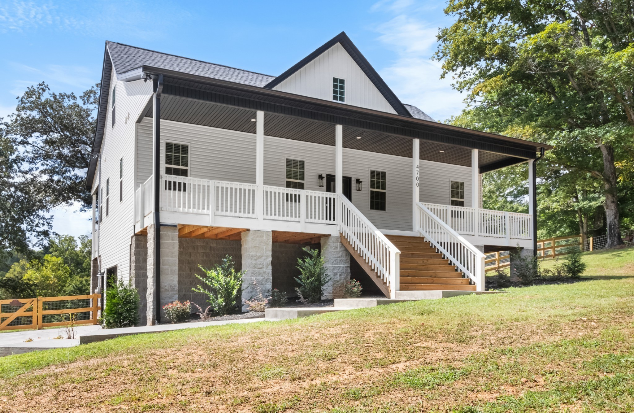 4700 Akin Road Cunningham, TN 37052 - Photo 3 of 36 a front view of a house with a yard