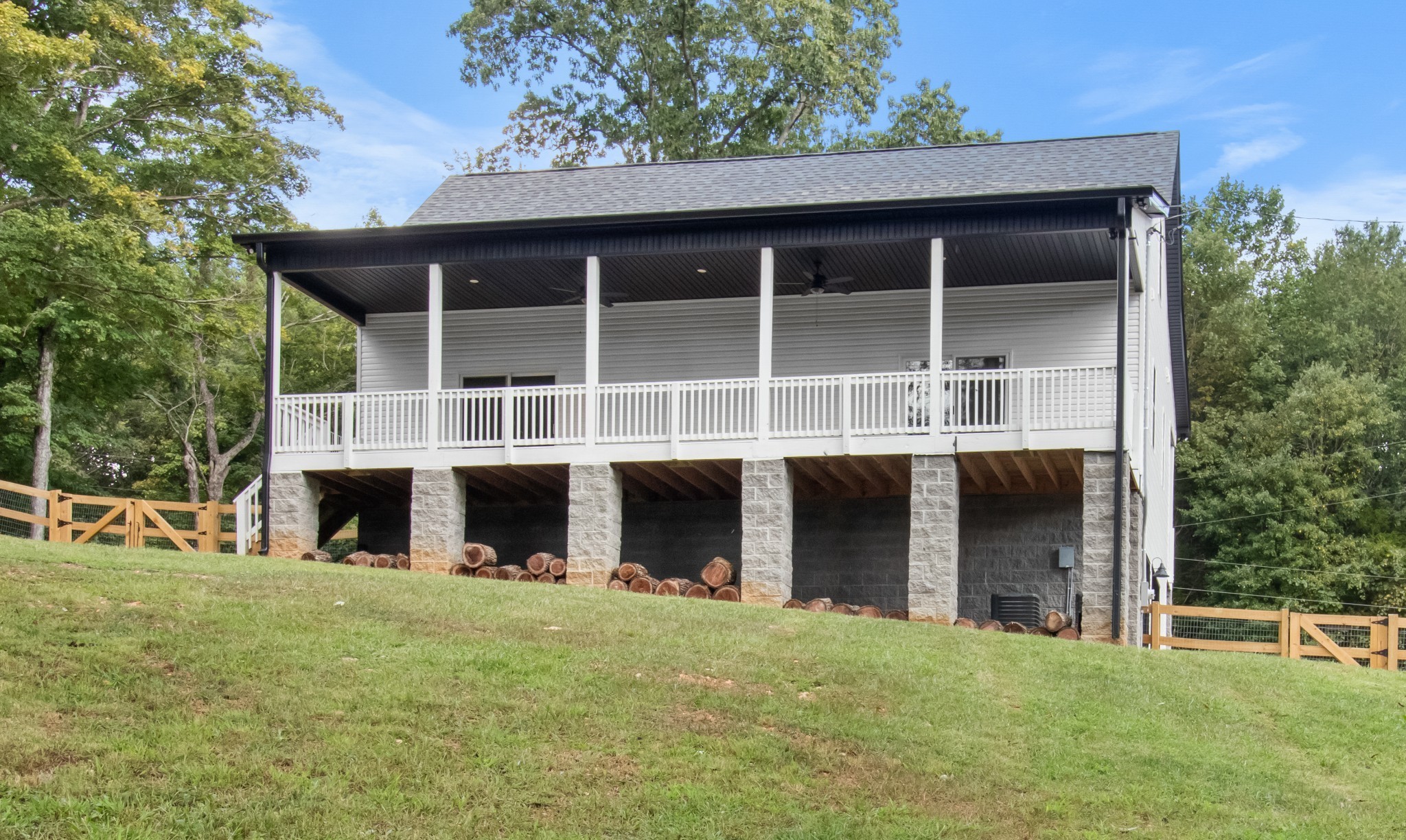 4700 Akin Road Cunningham, TN 37052 - Photo 31 of 36 a large building with a large windows