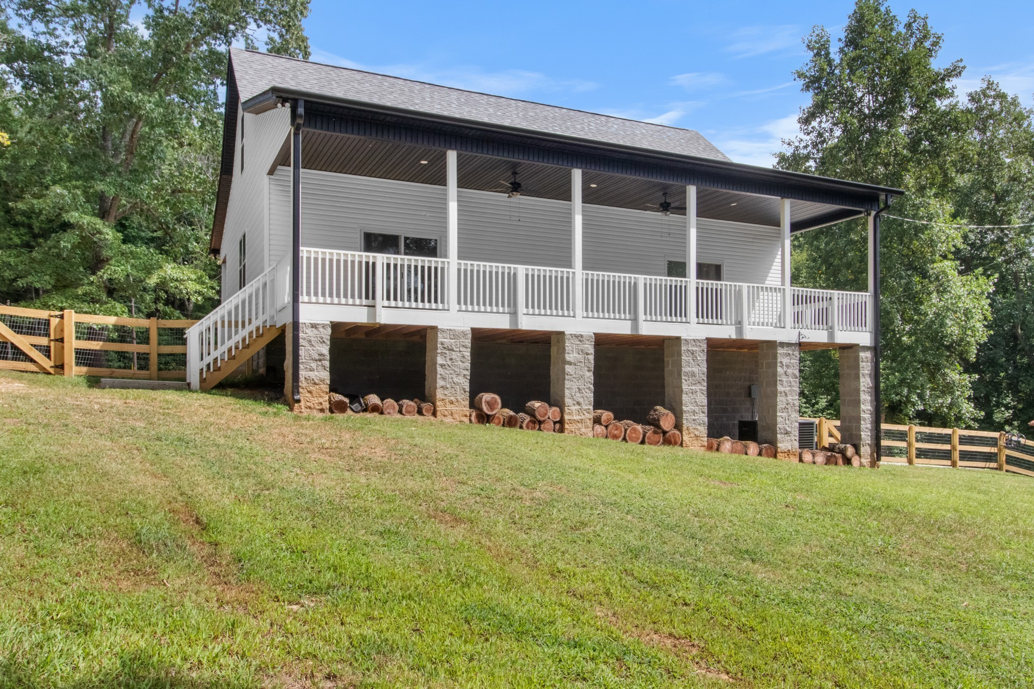 4700 Akin Road Cunningham, TN 37052 - Photo 32 of 36 a front view of a house with a yard
