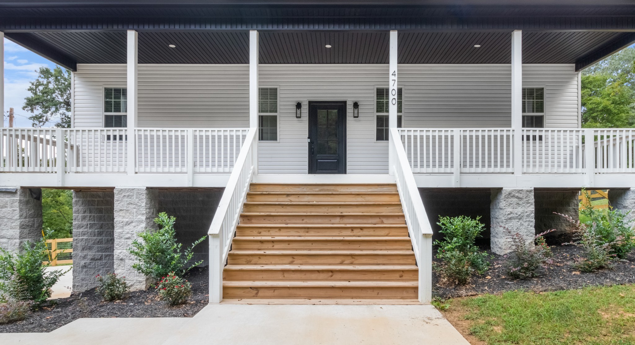 4700 Akin Road Cunningham, TN 37052 - Photo 5 of 36 a view of a house with a porch