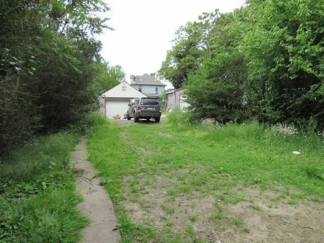 a view of a house with a park