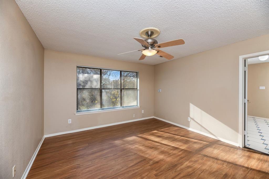 2317 Jenson Circle Fort Worth, TX 76112 - Photo 16 of 21 a view of an empty room with a window
