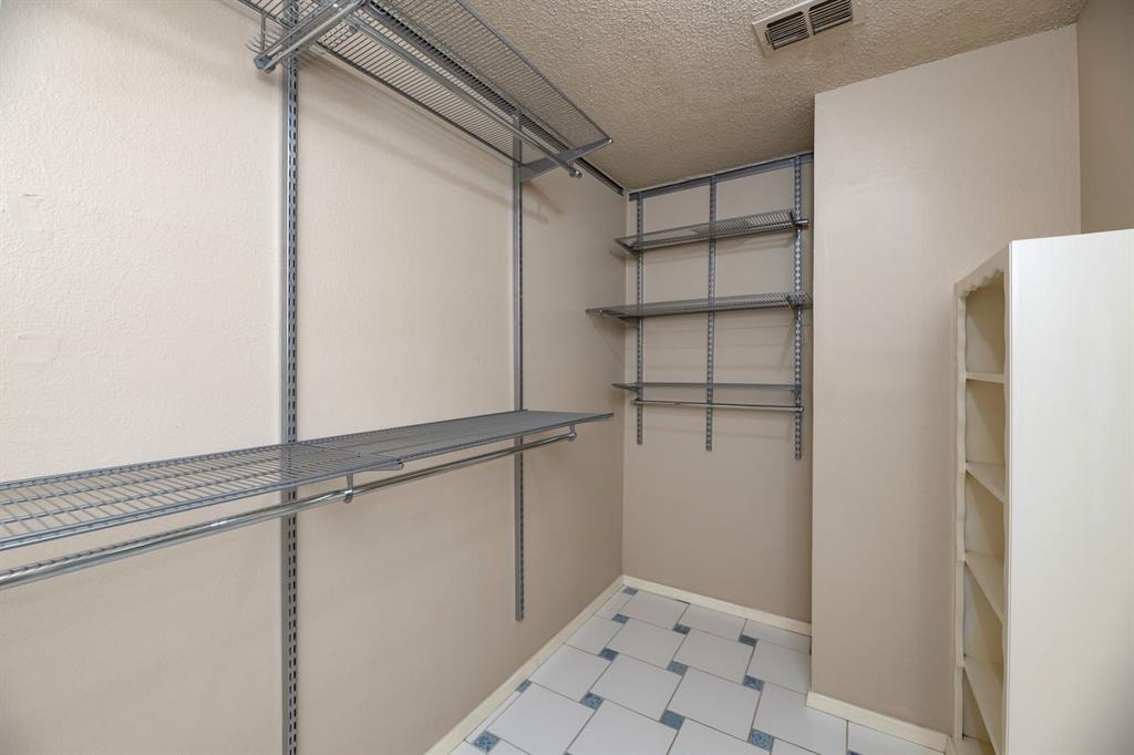 2317 Jenson Circle Fort Worth, TX 76112 - Photo 20 of 21 a view of an empty walk in closet