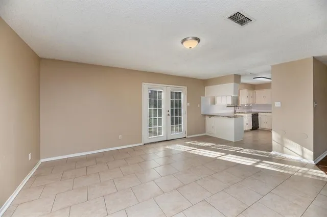 a view of a kitchen with a sink cabinets and a window