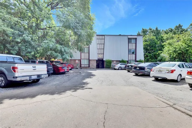 a car parked in front of a house