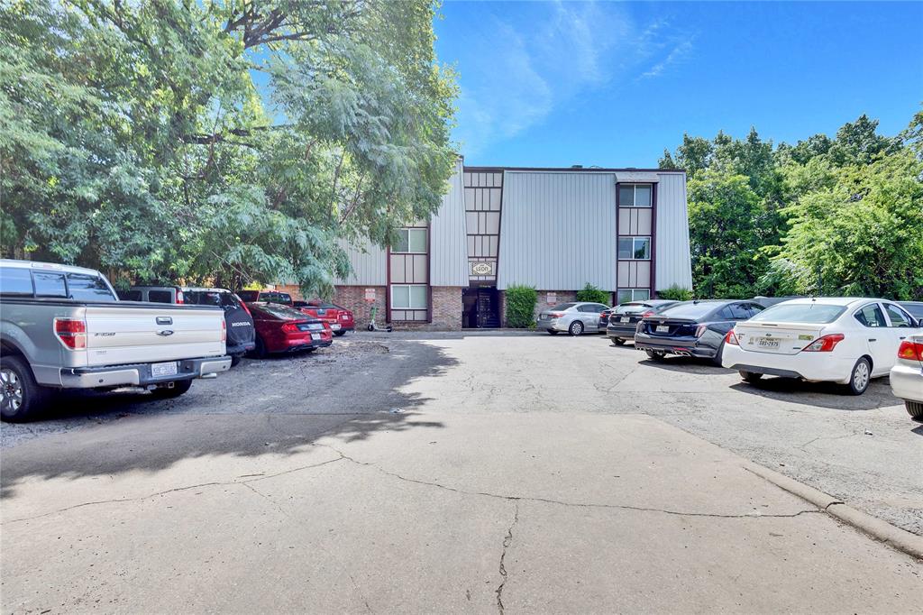 2207 Leon Street, Unit 303 Austin, TX 78705 - Photo 11 of 12 a car parked in front of a house